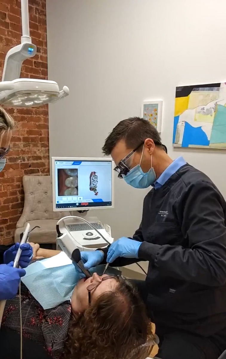 dentist performing restorative dentistry
