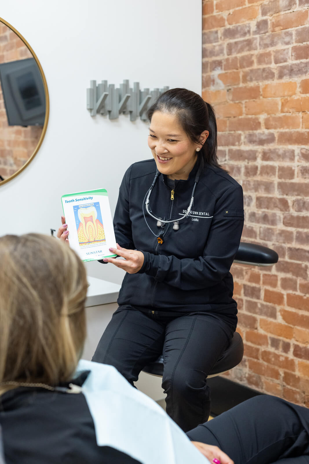 hygienist Laura educating on hygiene