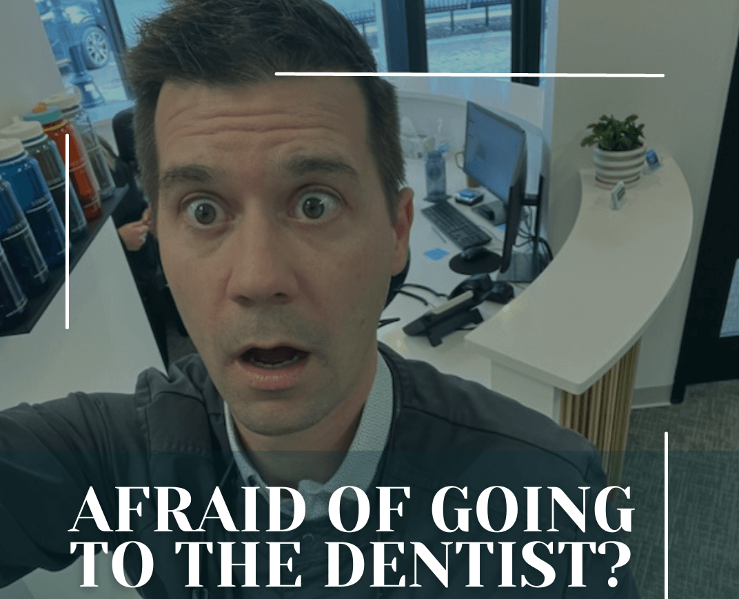 person looking fearful in dentist office
